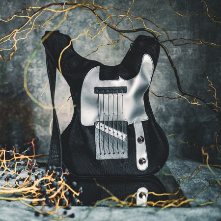 Black Monster Bag, a guitar-shaped bag made of premium eco-leather and real guitar strings