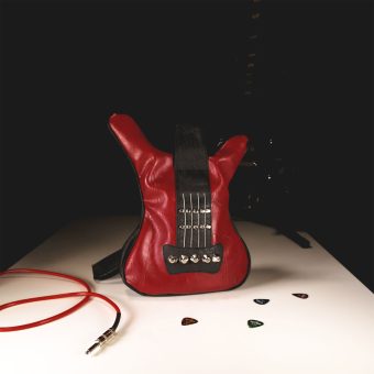 Red guitar bag in Italian eco leather with real guitar strings, a perfect rock-themed accessory from Bysolbags