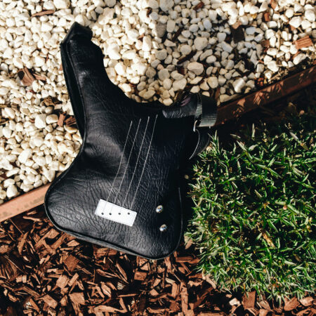 black guitar shaped bag