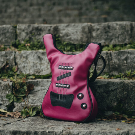 Pink bass bag in vegan leather decorated with real strings and staples