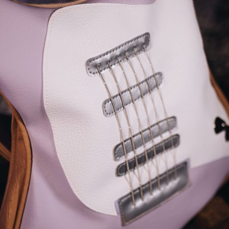 Cut Riffs Pastel purple handmade guitar-shaped bag with real guitar strings, a unique fashion statement from Bysolbags